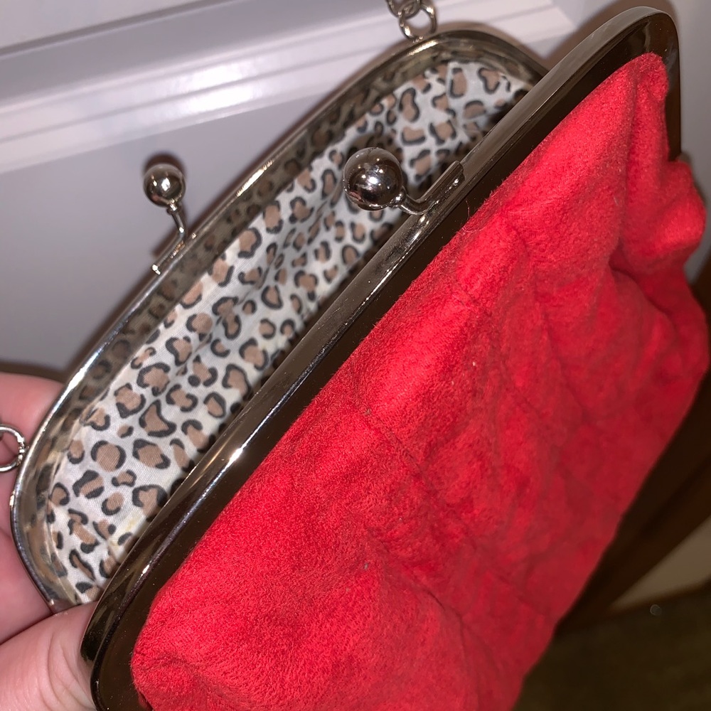 Over the shoulder suede clutch